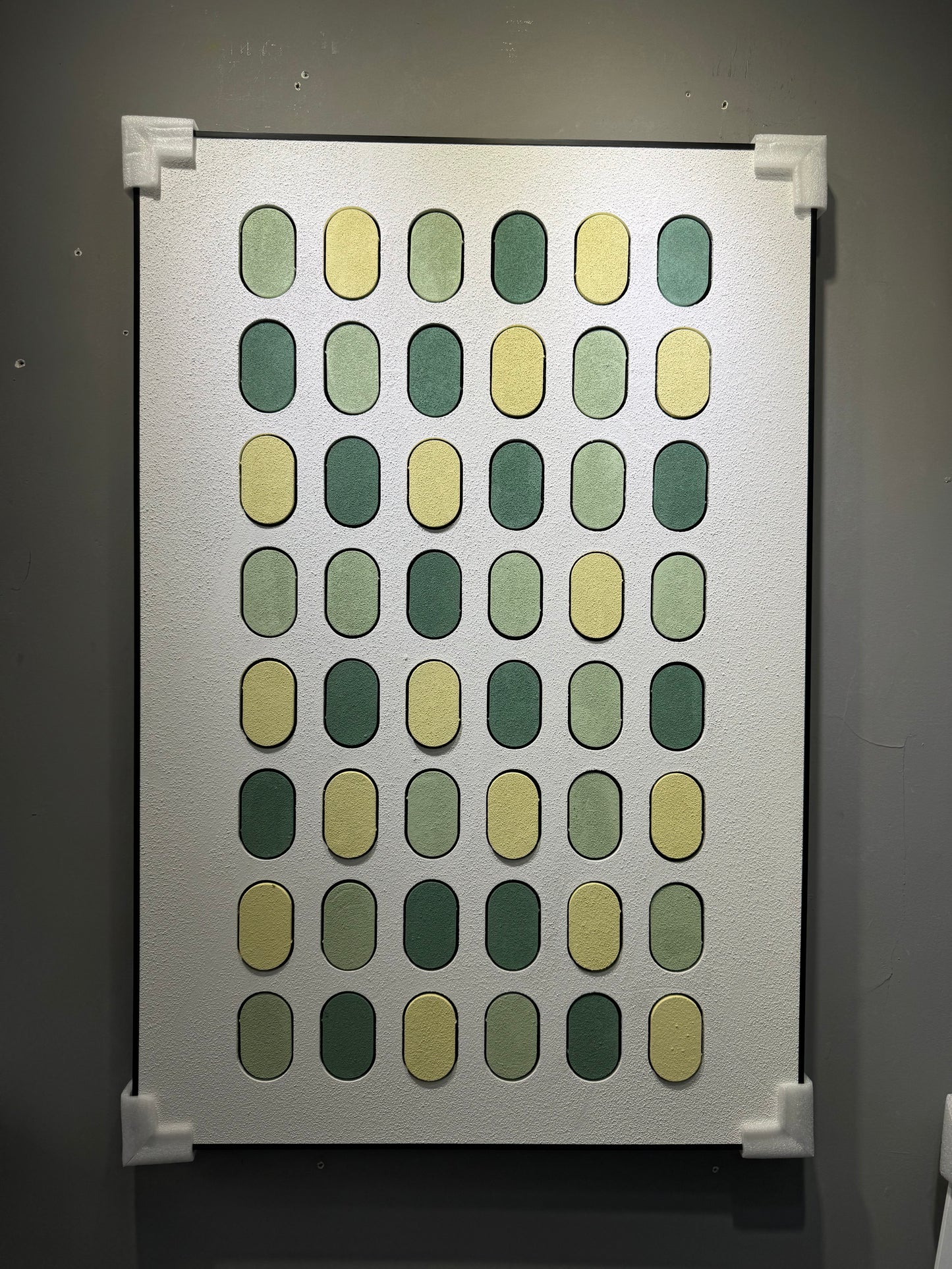 Modern minimalist 80×120cm geometric wall art with green and yellow ovals, wall-mounted display