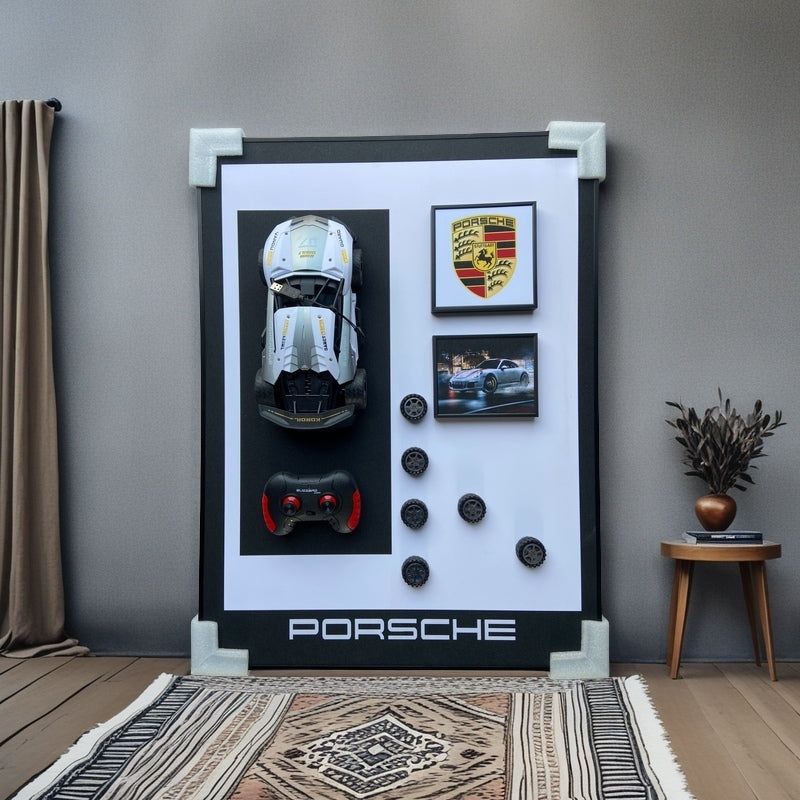 Porsche 3D RC car wall art with emblem, remote, wheels, and sports car image – modern decor for car enthusiasts