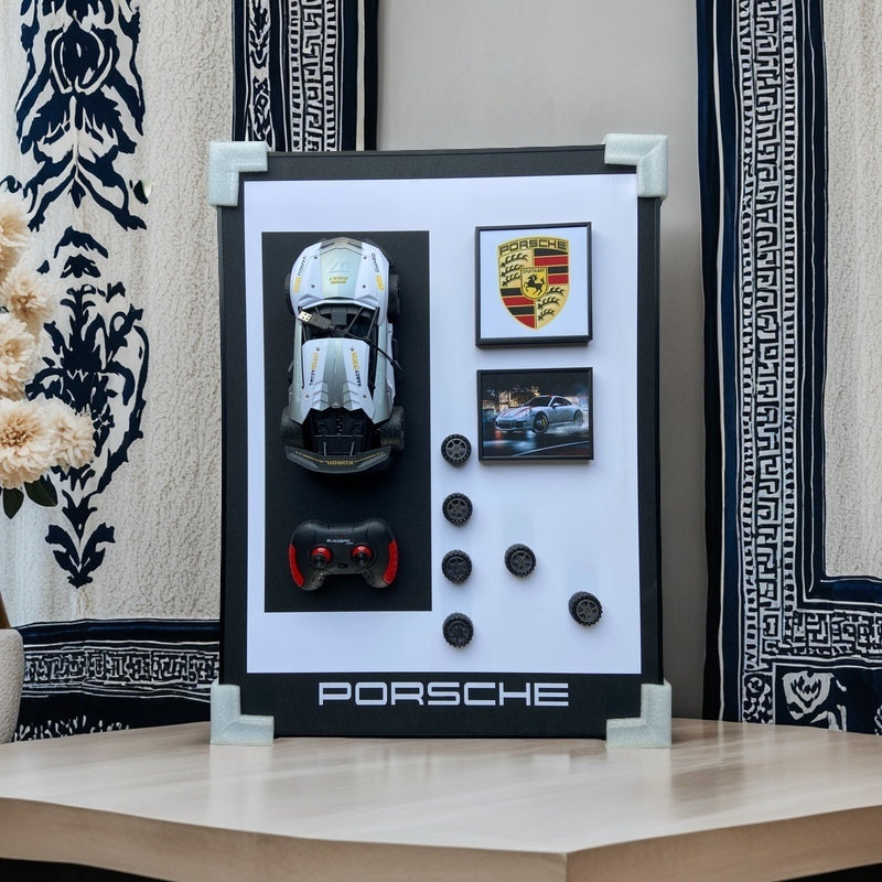 Porsche 3D RC car wall art with emblem, remote, wheels, and sports car image – modern decor for car enthusiasts