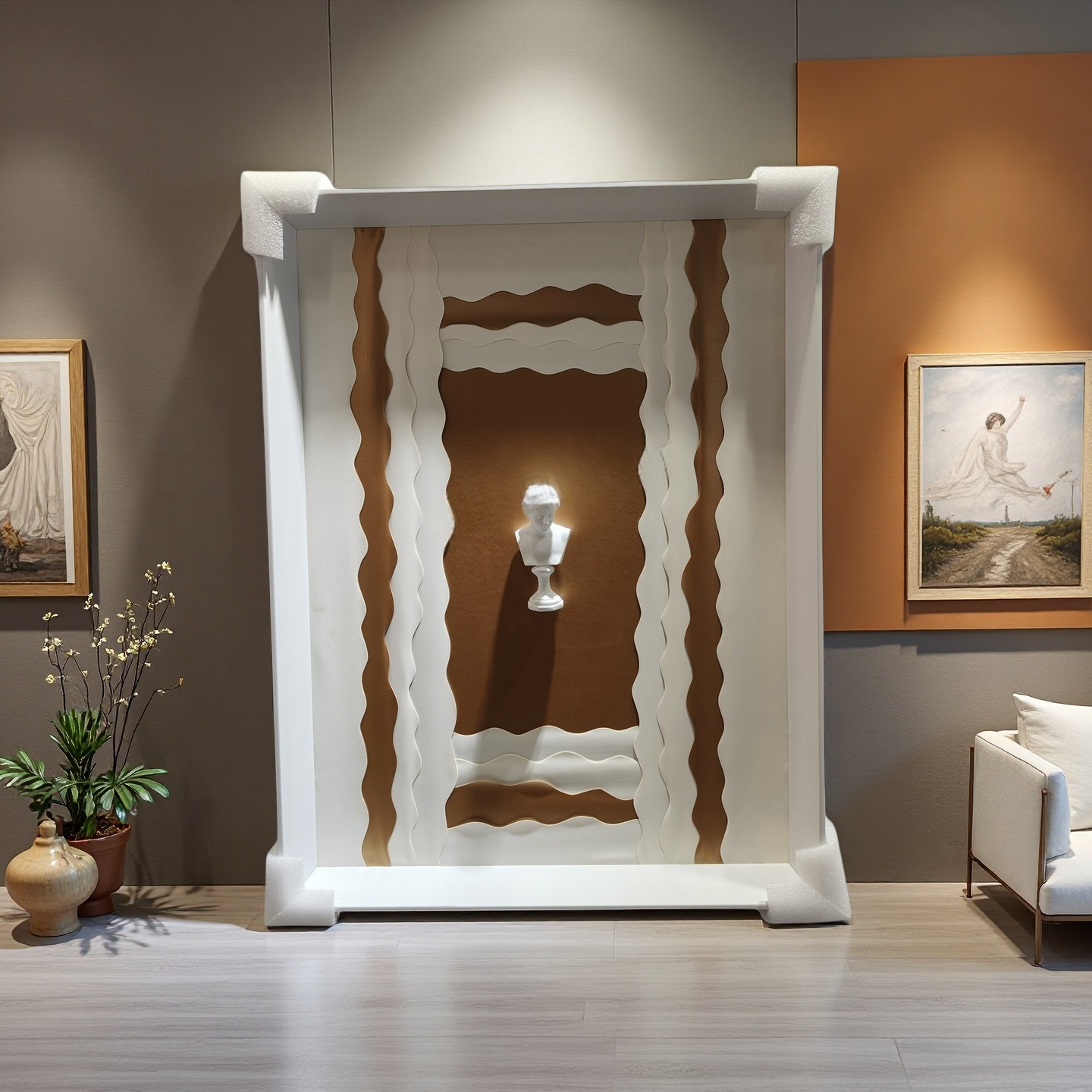 Sculptural relief wall art with classical bust in brown and white tones