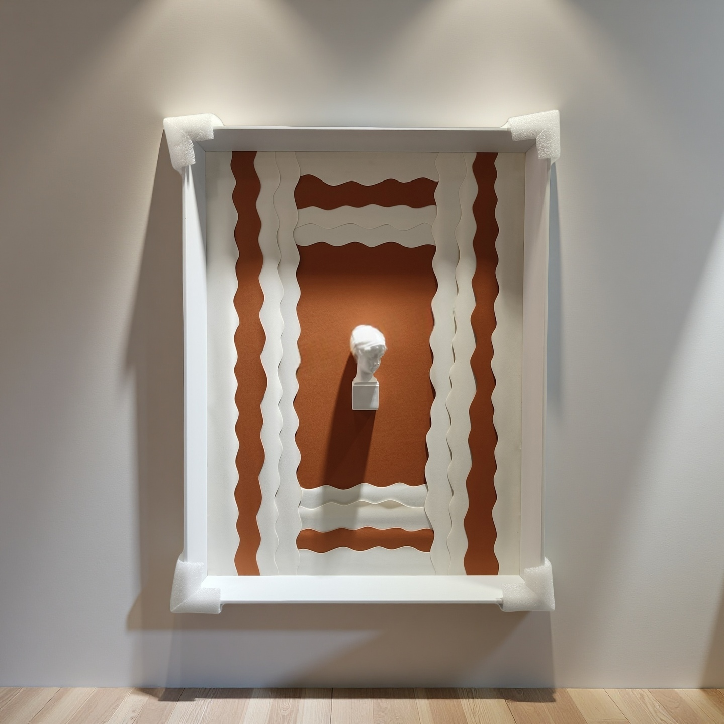 3D sculptural bust wall art with terracotta wave background and white frame – 50×70cm