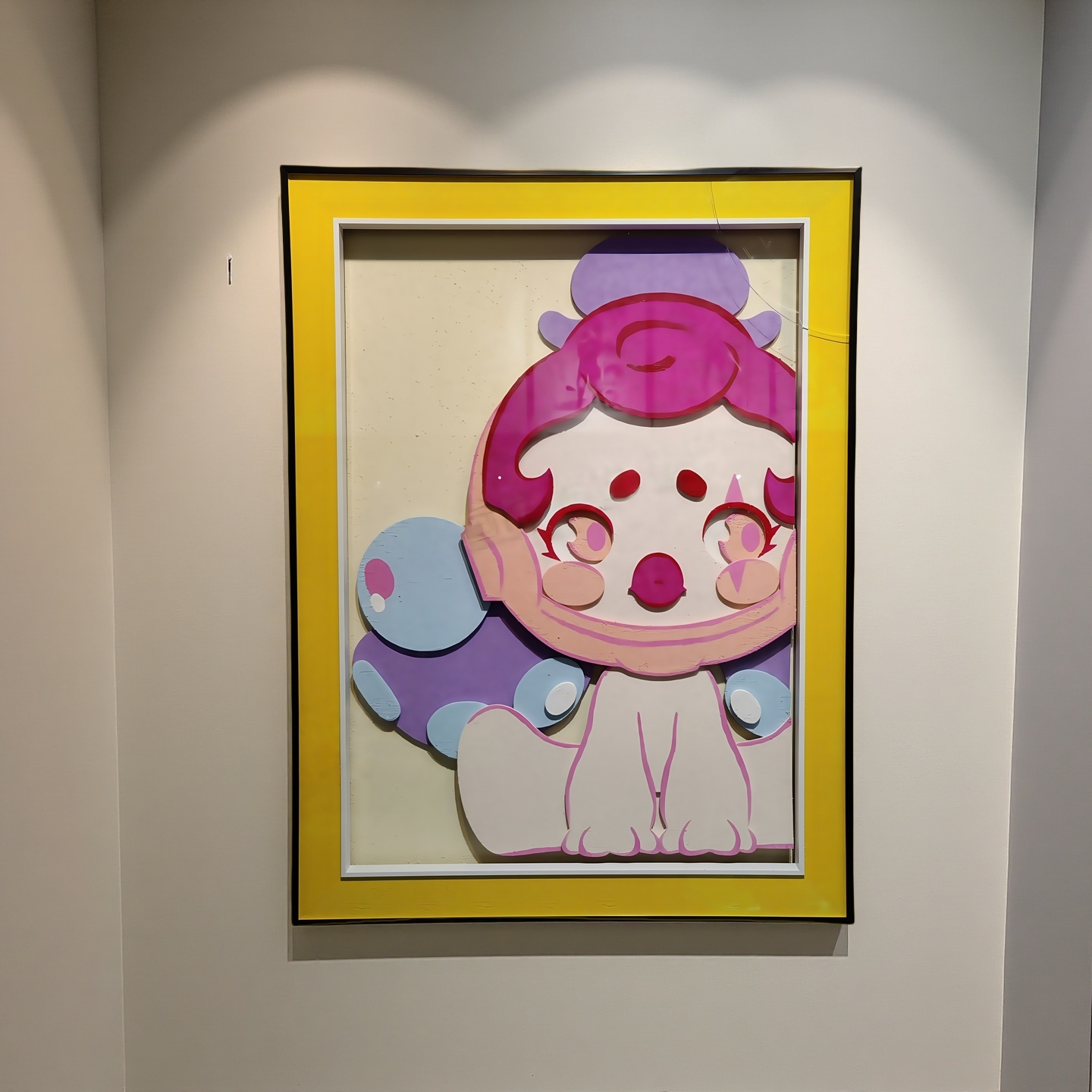 3D cartoon character wall art with yellow frame for playful room decor