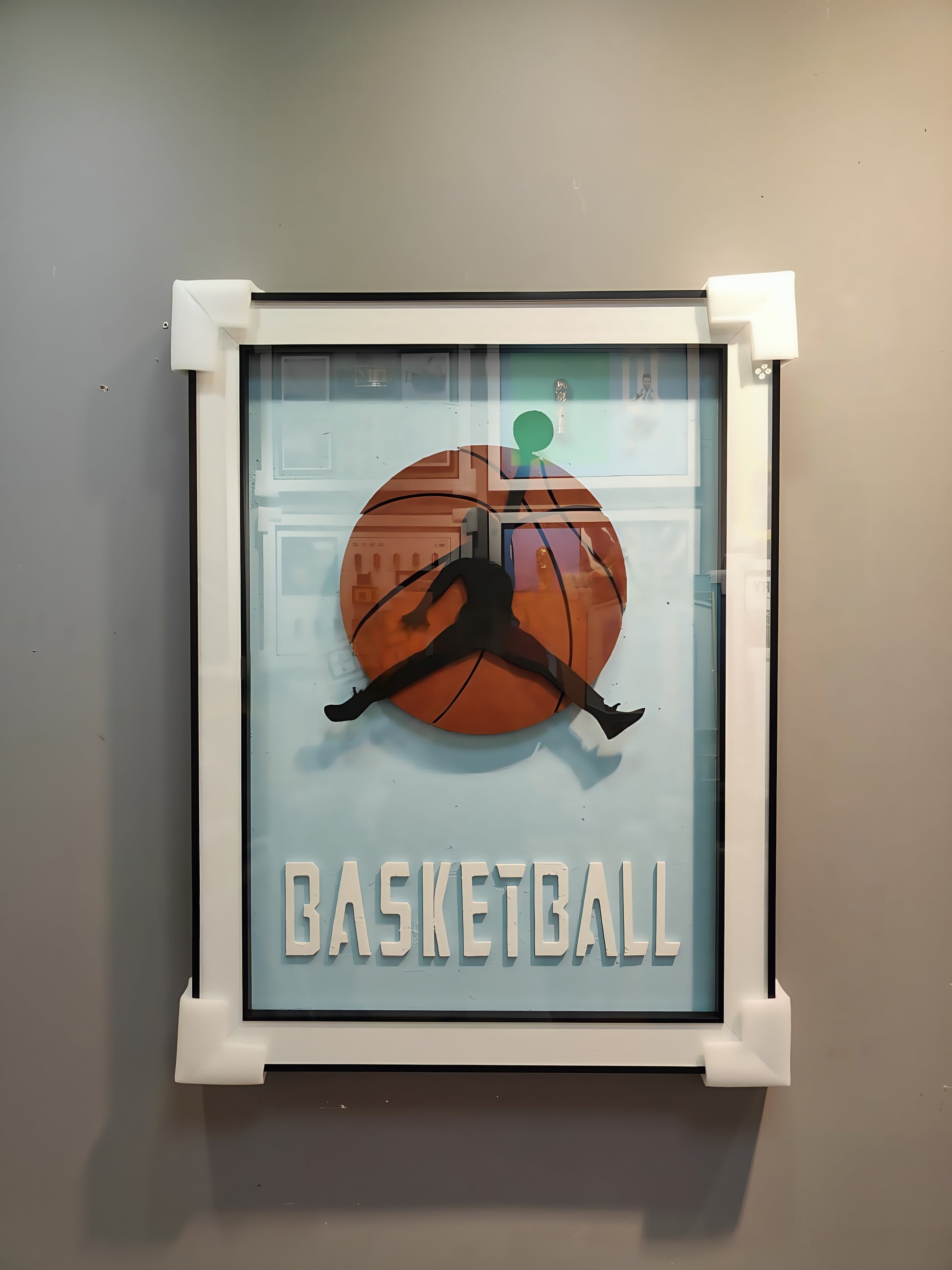 Wall-mounted basketball 3D artwork with slam dunk silhouette and blue background

