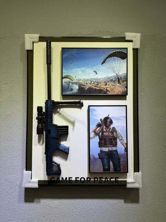 Game for Peace 3D wall art with parachute landing scene, character print, and realistic 3D gun on white board, 50×70cm wall-mounted
