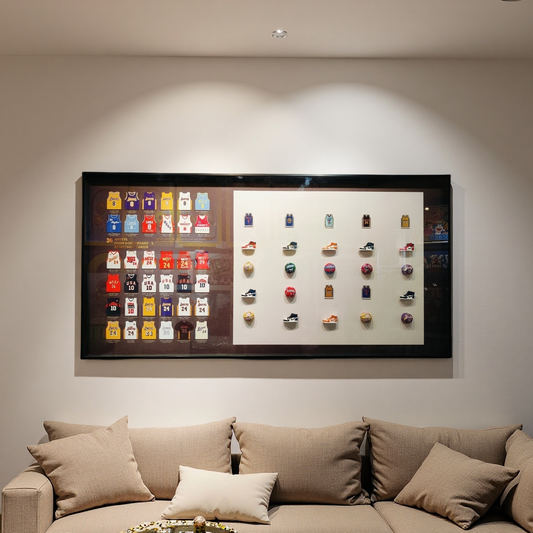 Framed 3D Kobe Bryant wall art featuring 36 jerseys, sneakers, and basketballs in a 60×120cm display.
