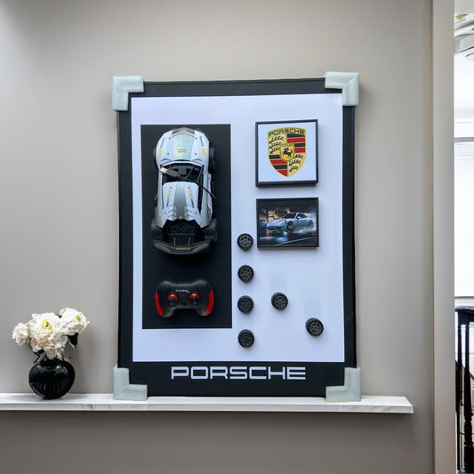 Porsche 3D RC car wall art with emblem, remote, wheels, and sports car image – modern decor for car enthusiasts