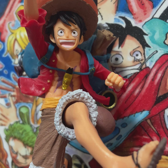 One Piece 3D wall art featuring Luffy figurine and vibrant manga poster design