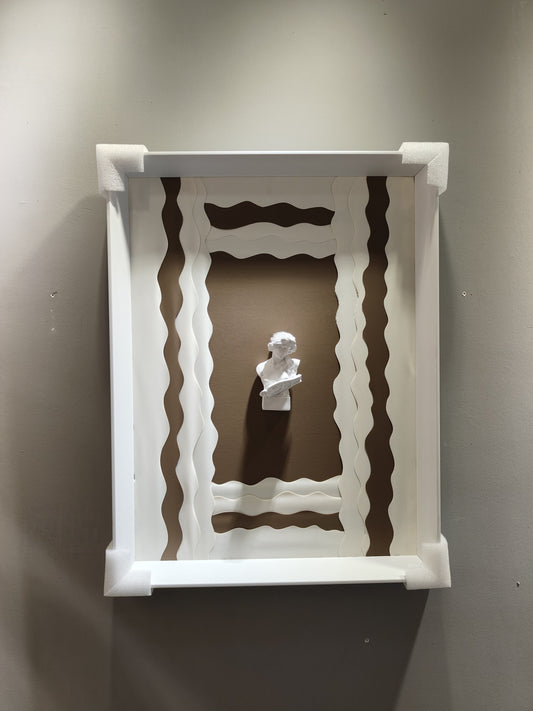 Minimalist wall art with wavy white frame and 3D plaster bust on taupe background

